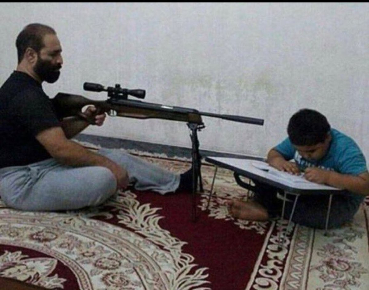 father holding sniper rifle over studying son meme template
