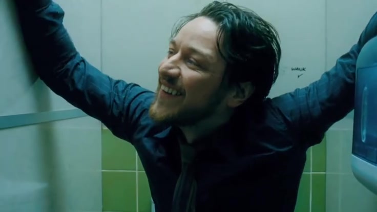 Kevin Crumb laughing in bathroom