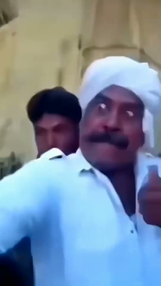 A lot of chaotic overlapping shouting in a regional language.