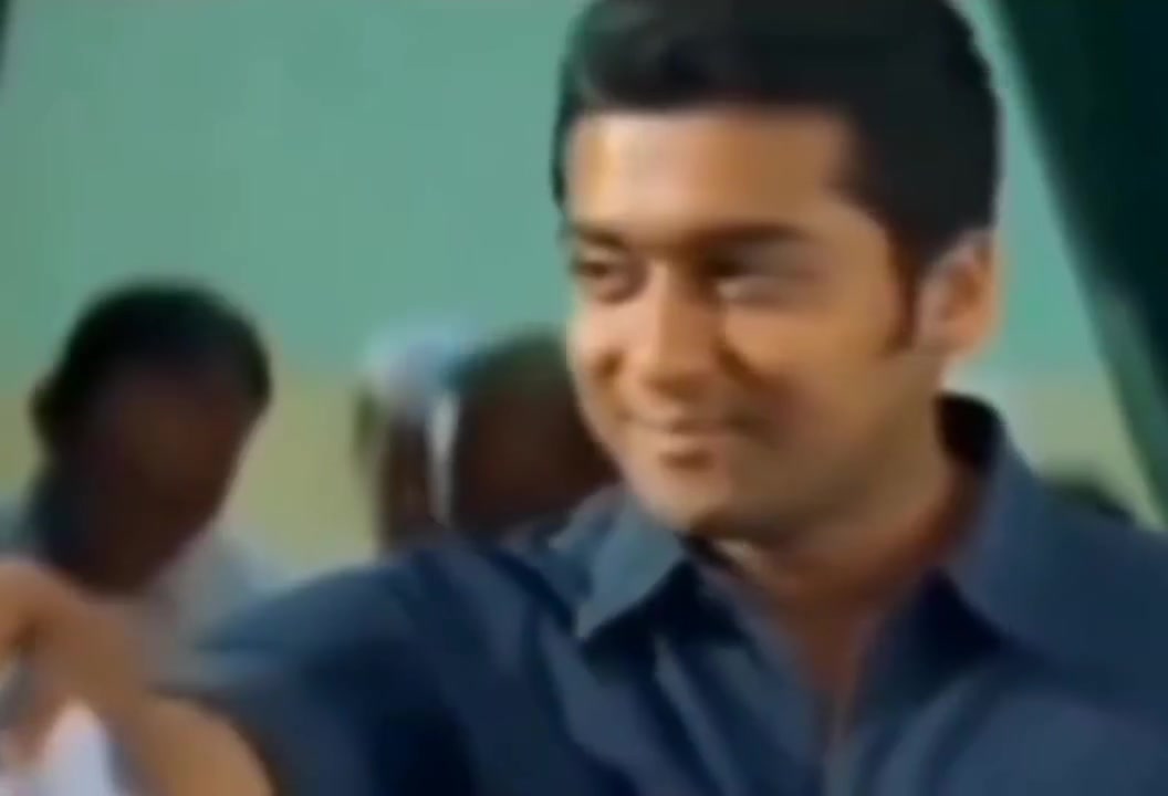 Suriya dismisses someone with a flick