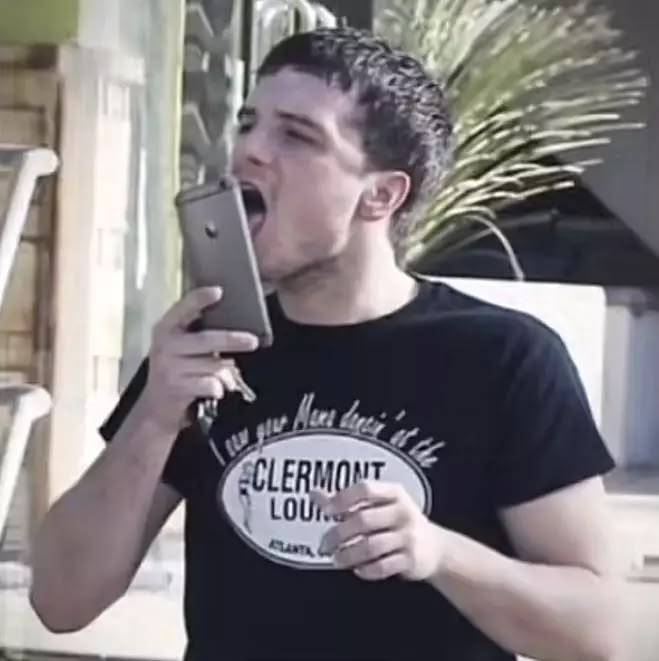 Josh Hutcherson licking phone