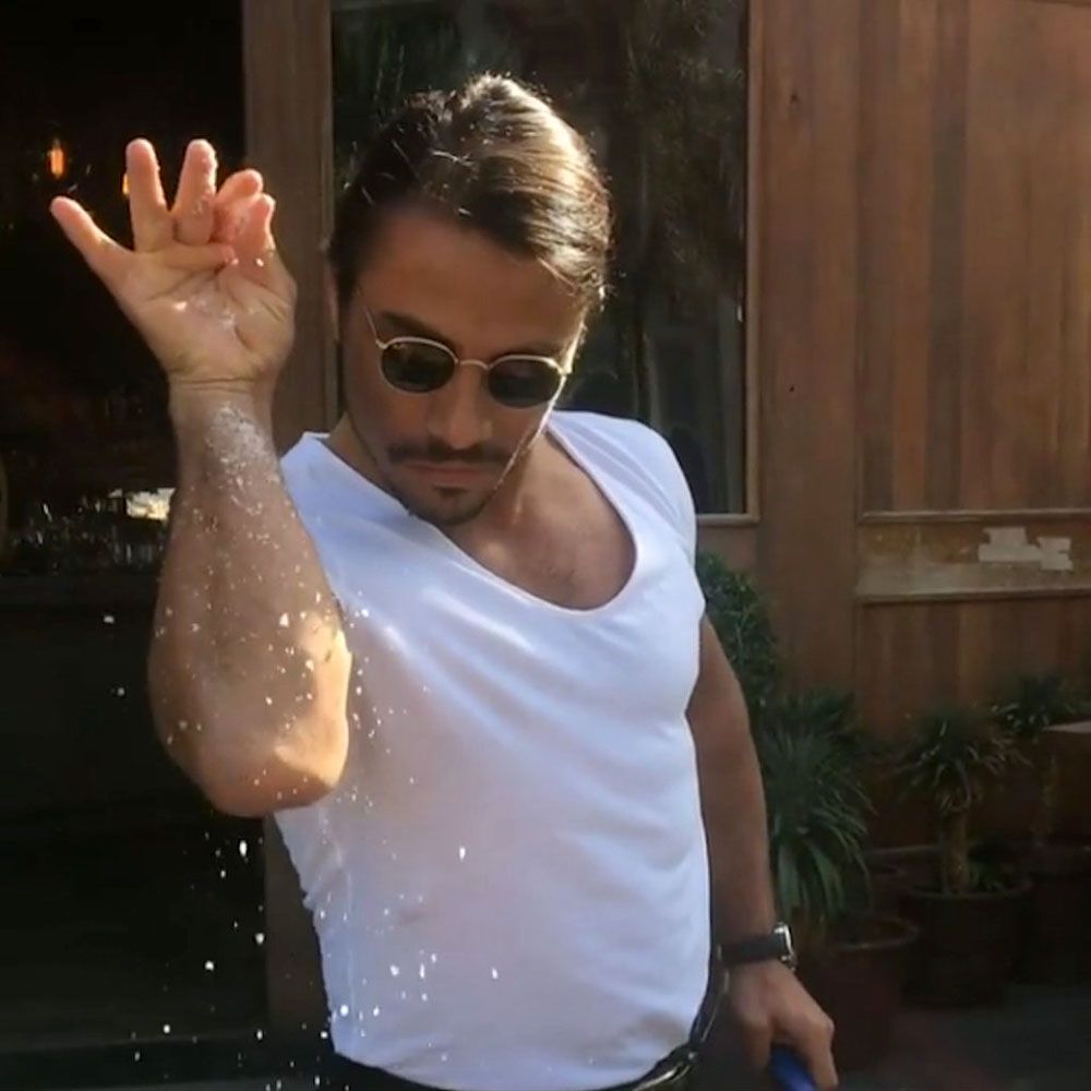 Salt Bae seasoning meat